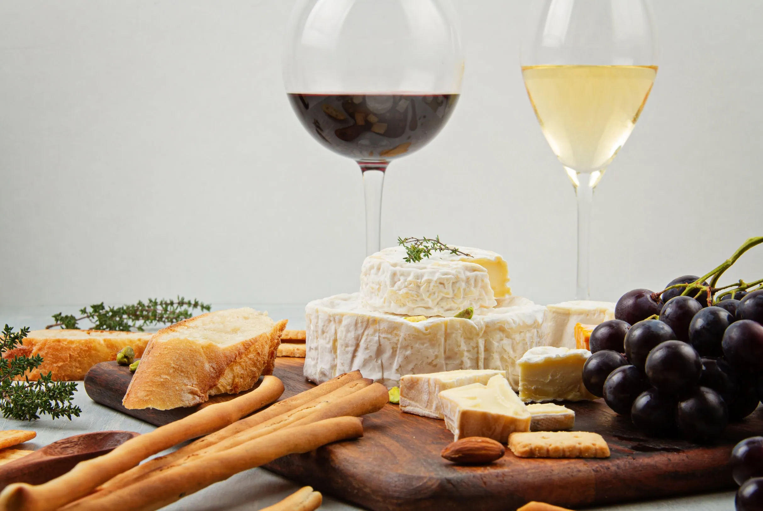 cheese and wine party ideas - cheese plate and a glass of wine